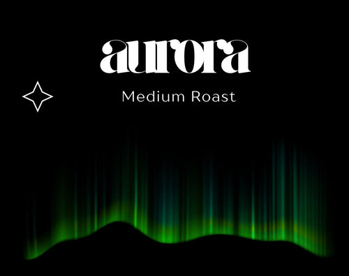 Aurora coffee packaging with green Northern Lights design on a black background