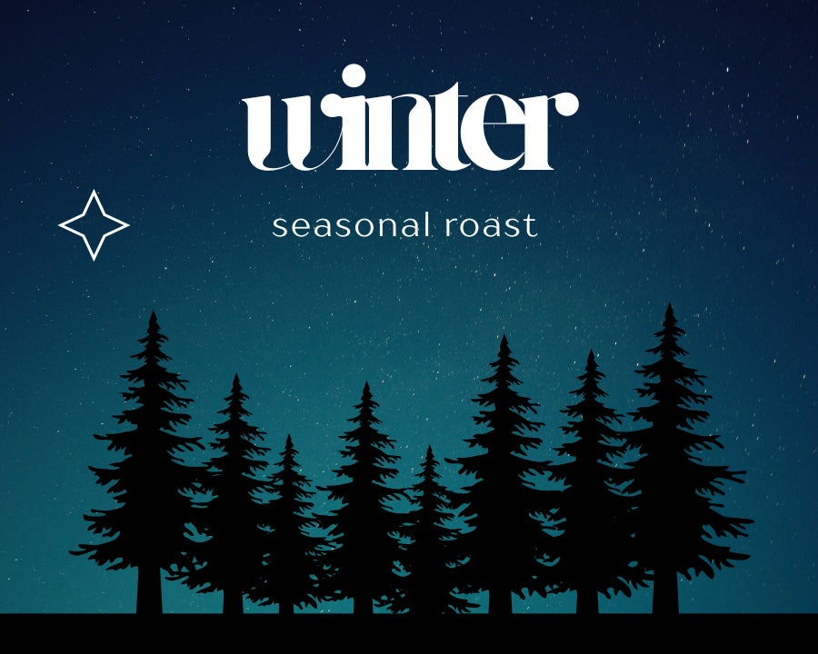 Silhouette of trees against a dark blue sky with 'winter seasonal roast' text.